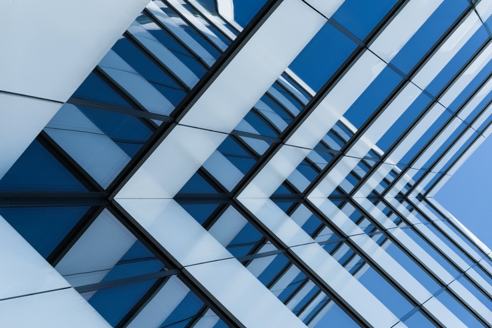 Abstract,View,Of,A,Modern,Glass,Building,Facade,With,Strong